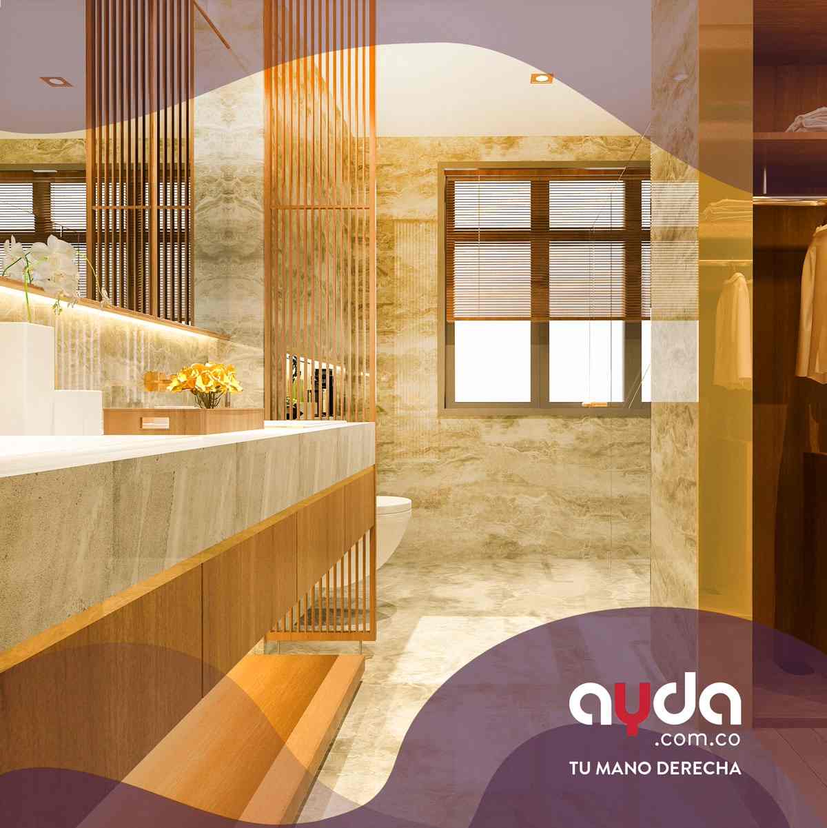 Vista de un baño elegante con paredes y suelos revestidos en un tipo de cerámica con acabado de mármol beige, lavabo de madera y vestidor integrado con iluminación cálida